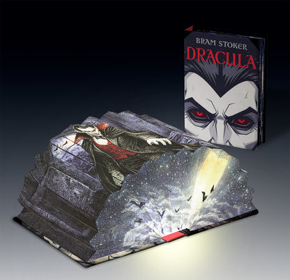 Dracula light book, open and lit beside the closed book
